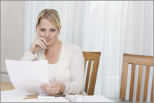 woman reading letter