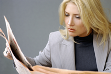 businesswoman reading newsletter