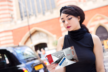 woman with postcard