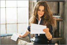 woman reading letter